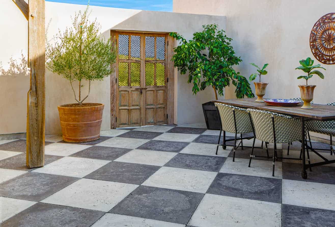 Checkerboard concrete pavers in a courtyard